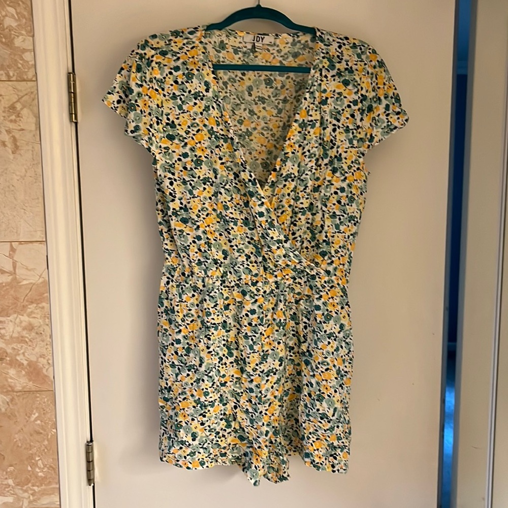 Floral romper with flutter sleeves